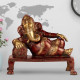 NOVELIKA-Brass Ganesh Ganesha Resting on Designer Couch (Pack of 1)