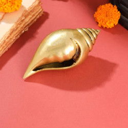 Novelika -  Brass Shankh (Conch Shell) on a stand(NA610) Novelika -  Brass Shankh (Conch Shell) on a stand(NA610)